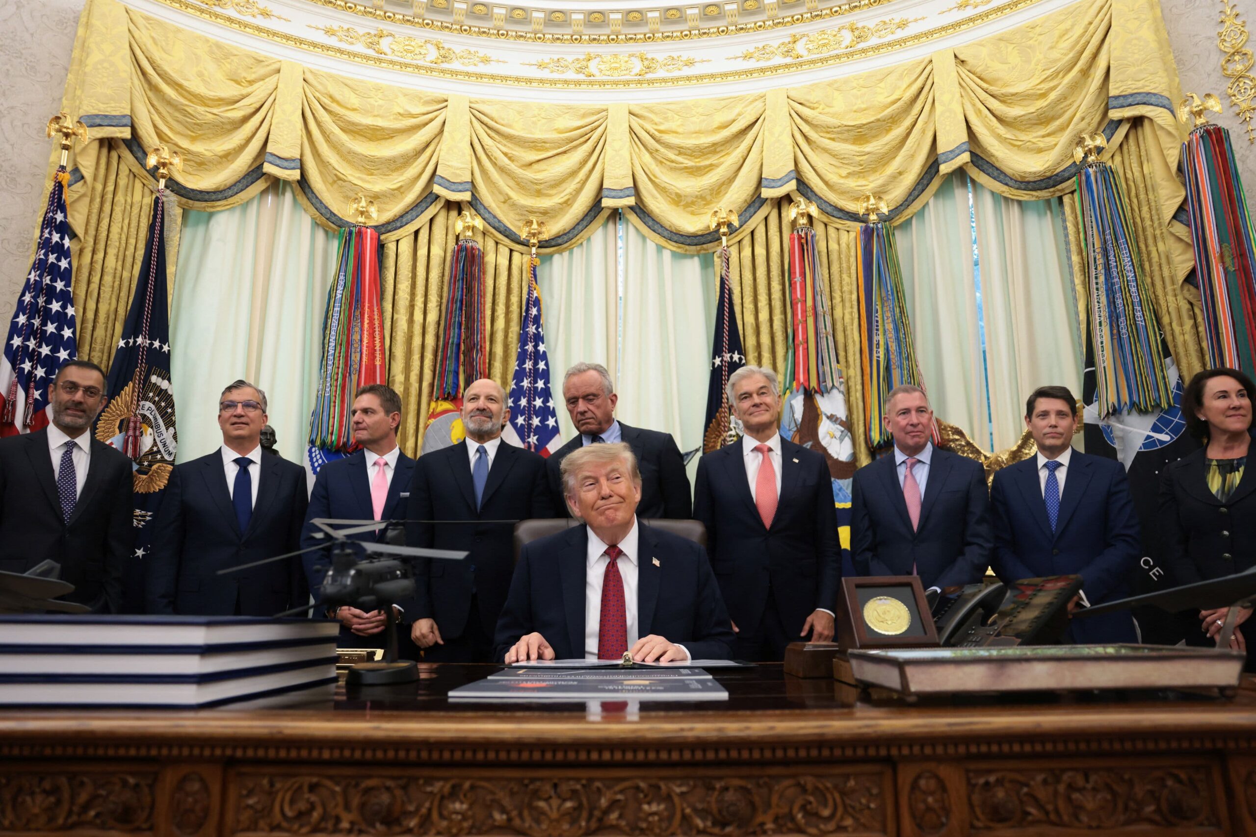 Trump strikes new drug pricing deals with nine midsized drugmakers