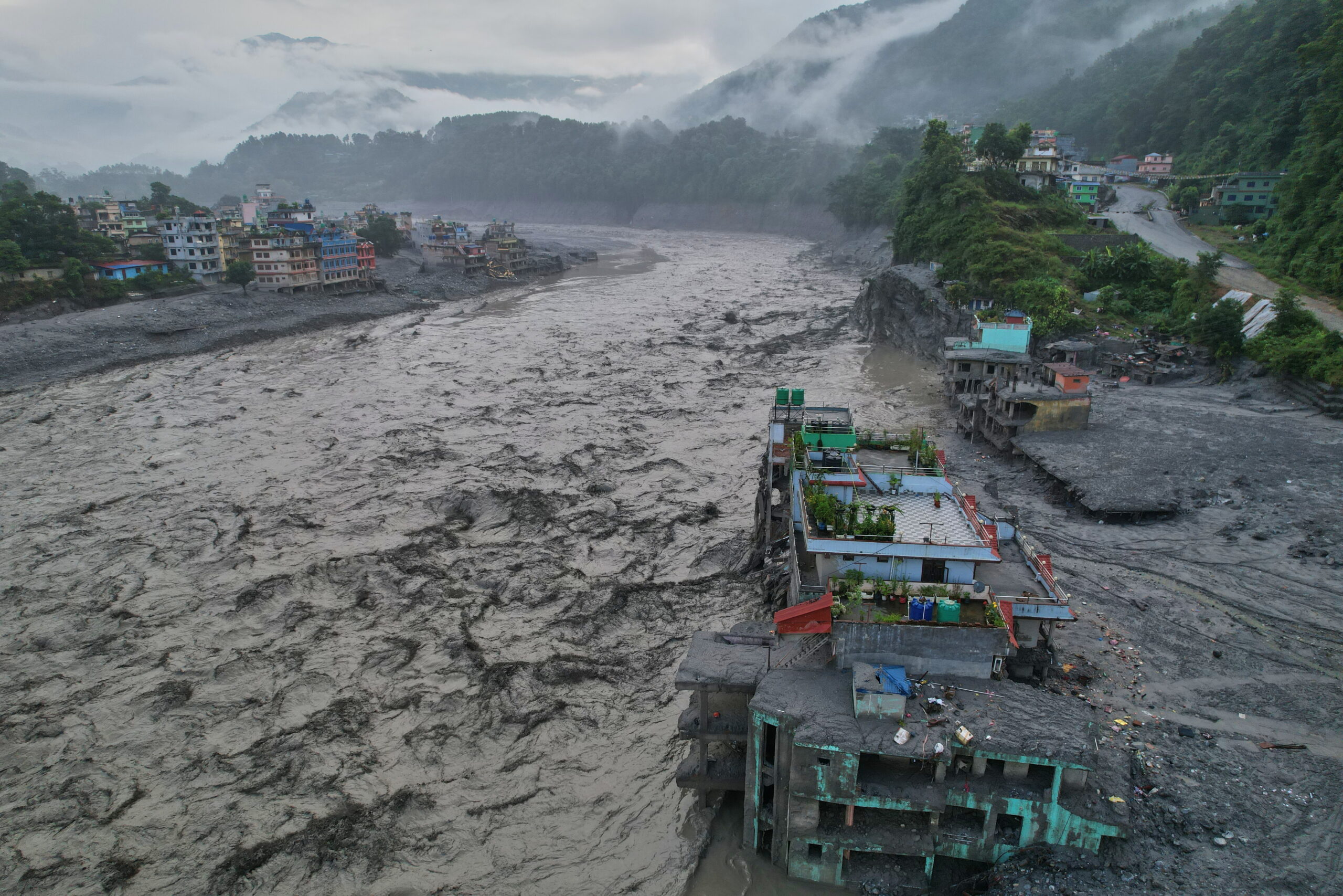 Nepal's hesitance to accept foreign help for flood relief comes under scrutiny