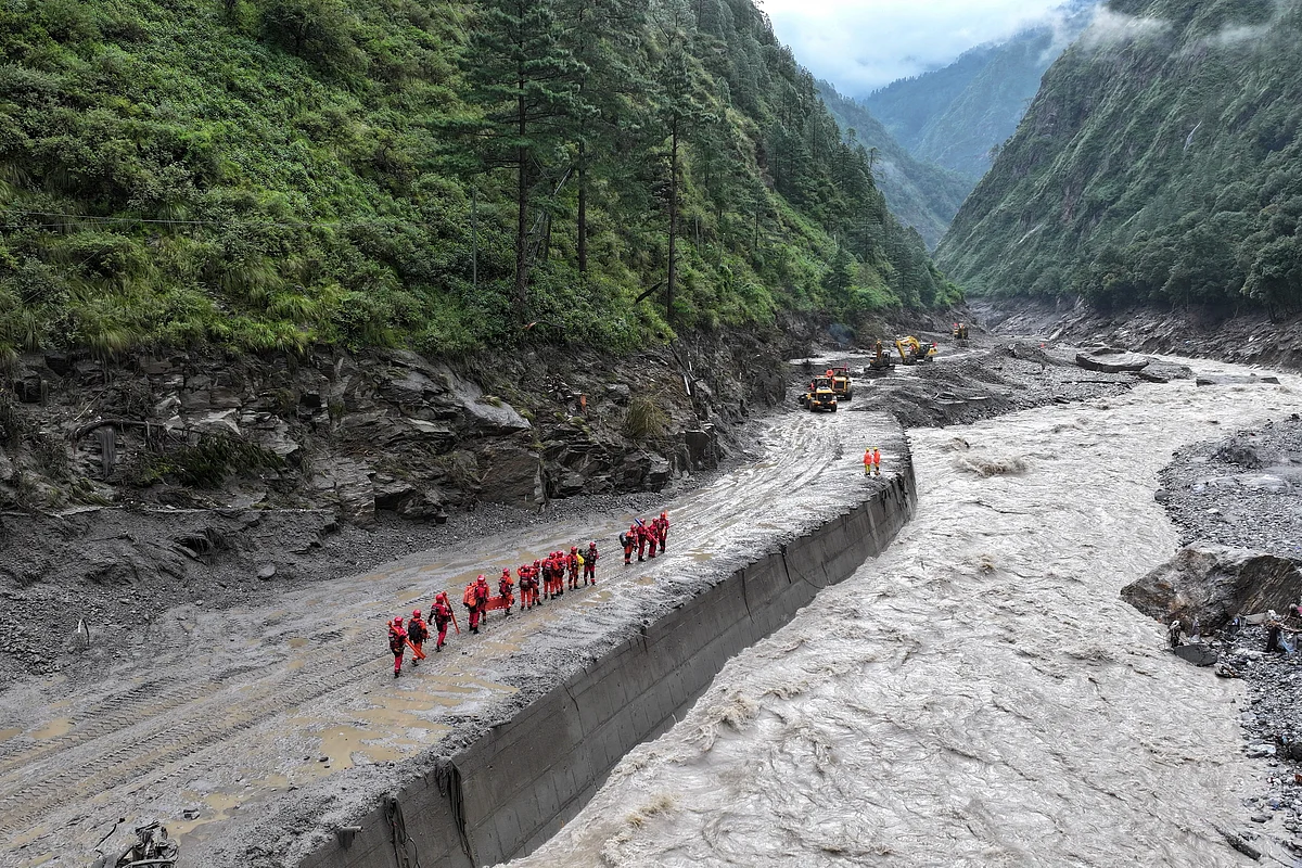 Nepal orders rescuers to safety as overflow brings new flood risks