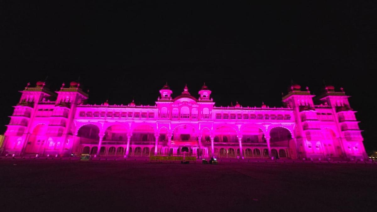Mysuru palace glows pink as Gruha Lakshmi completes three years
