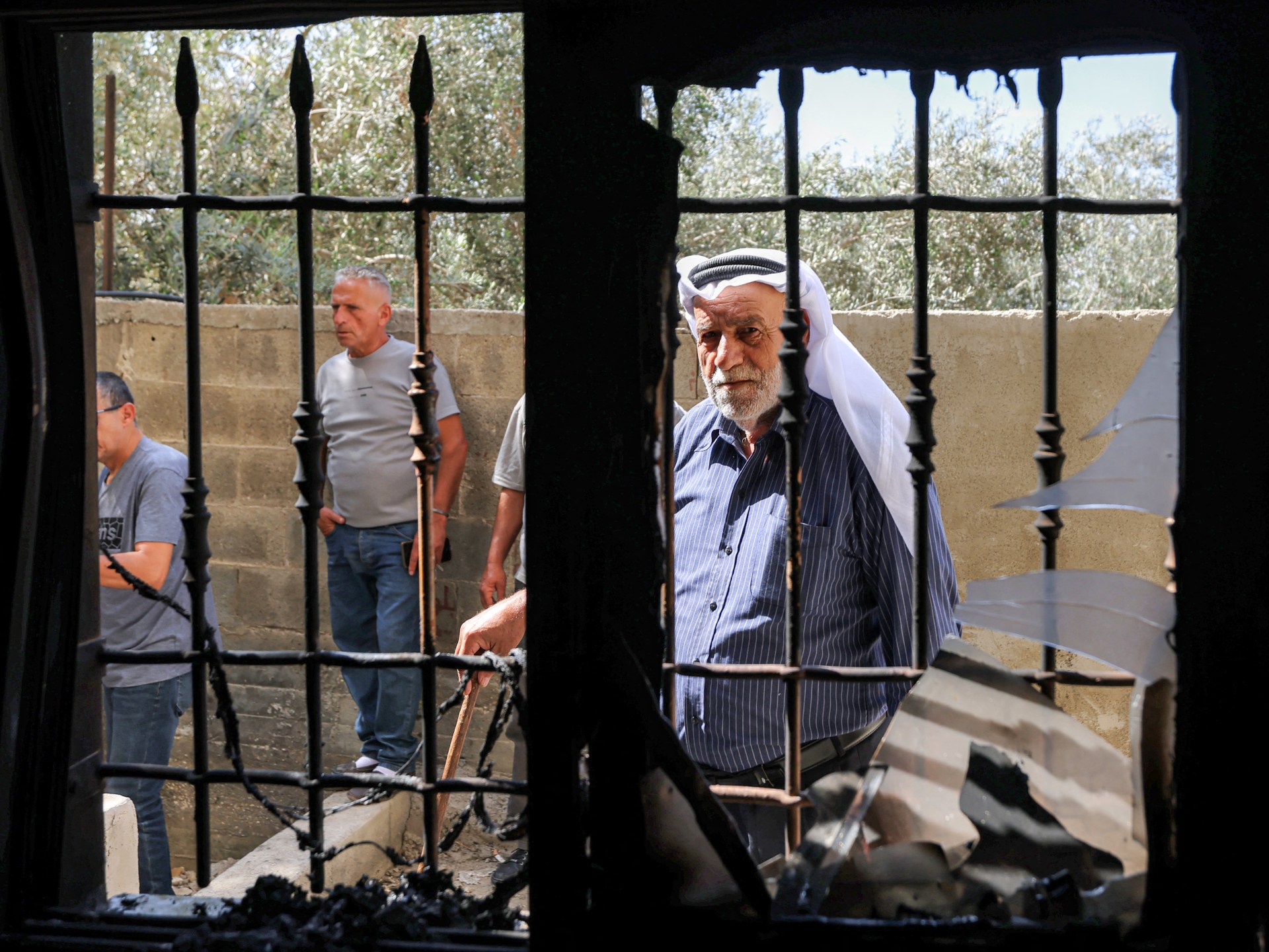 Israeli forces, settlers attack two West Bank mosques