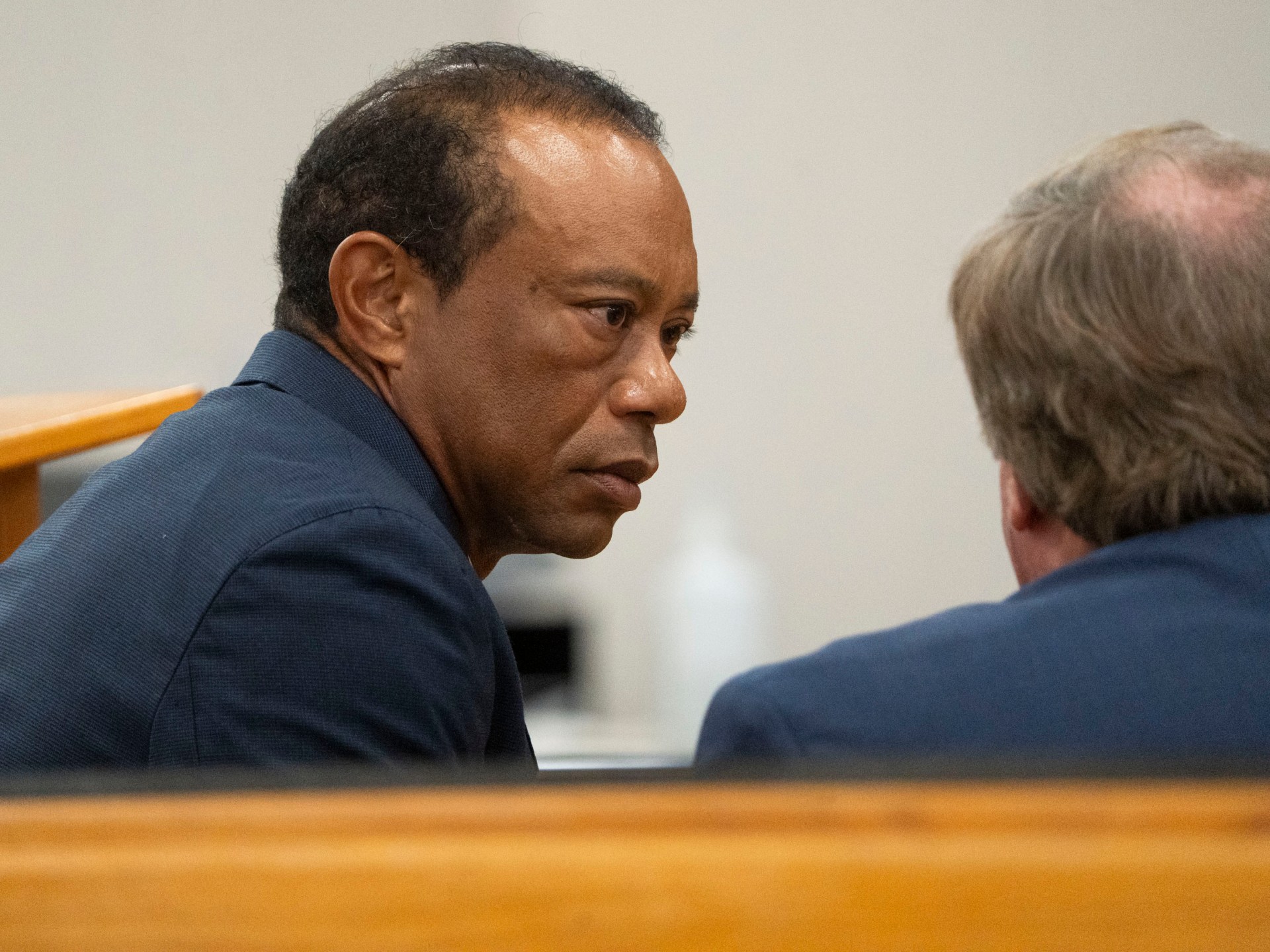 Tiger Woods pleads guilty to reckless driving, forfeits driving licence
