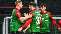 Glens beat Blues to progress as holders Carrick bow out