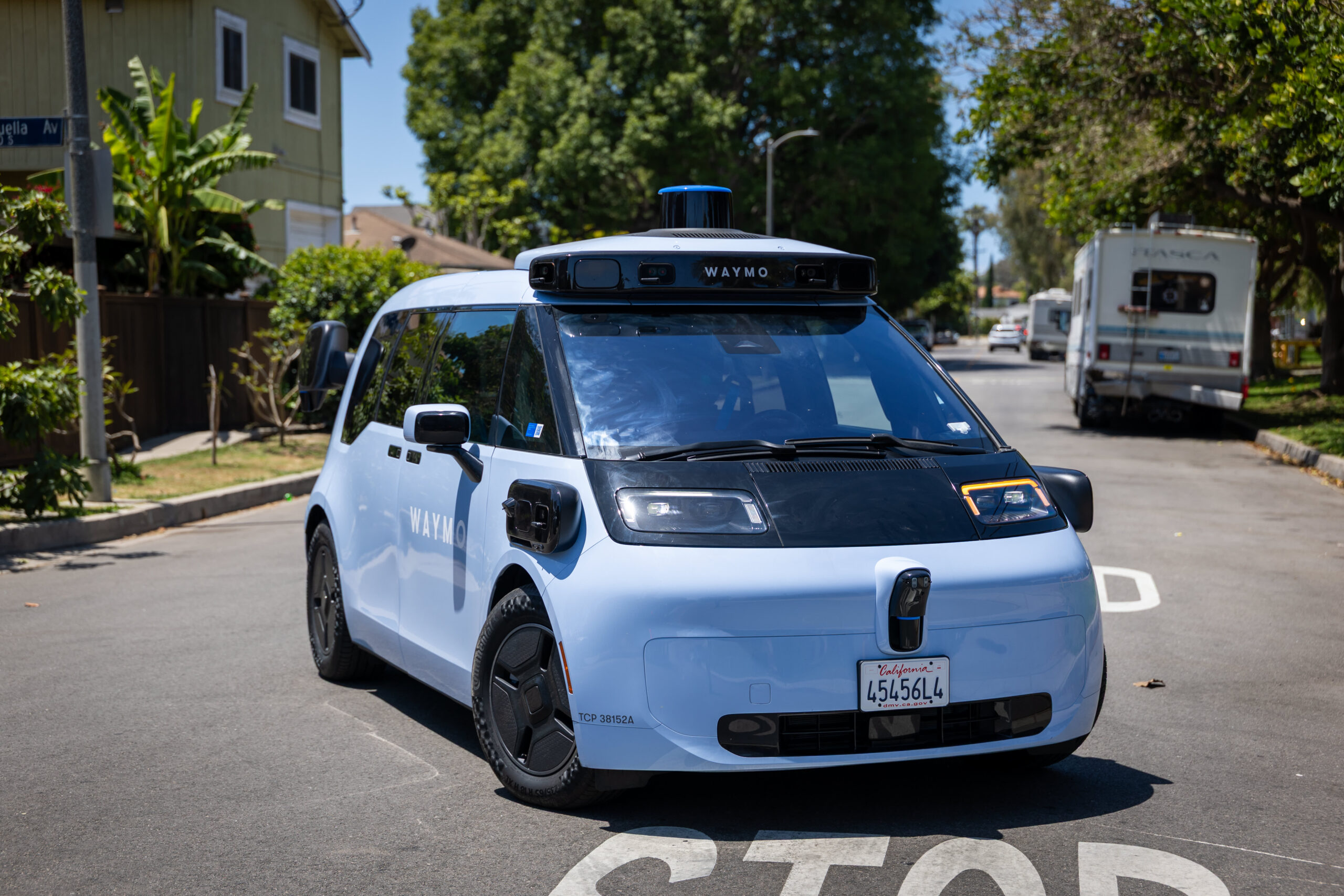 Waymo and Zoox expand into more U.S. markets as robotaxi race heats up