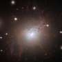 A supermassive black hole erupted in X-rays, and its radio jets followed 300 days later