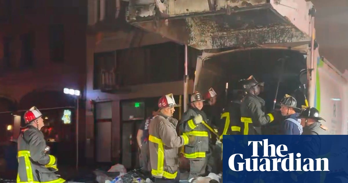 San Francisco fire officials rescue man trapped inside garbage truck